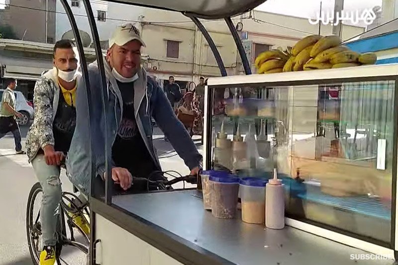 زعزع بلدي فوق دراجة