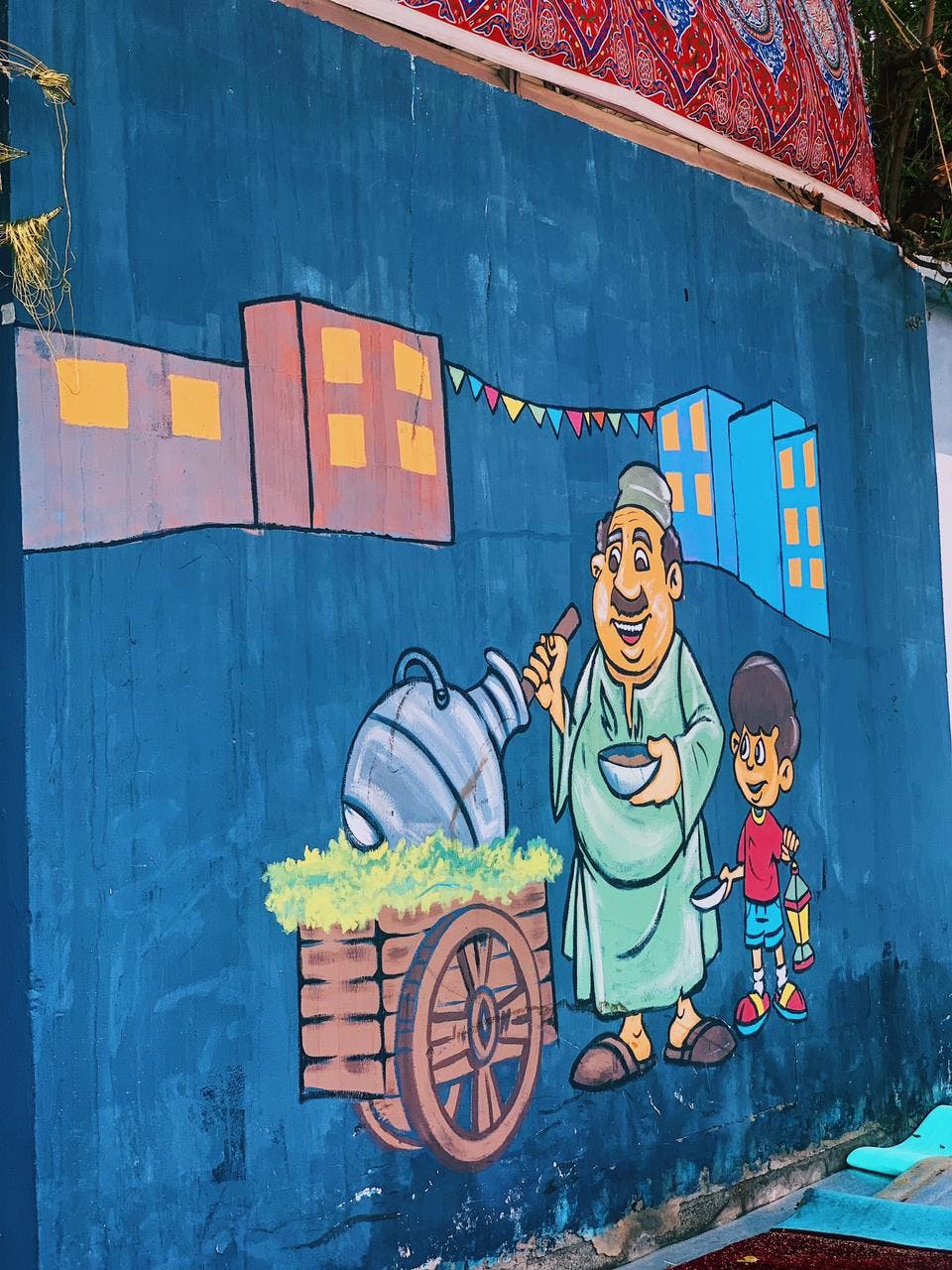 فنانان تشكيليان يحولان جدران الطائف إلى تحف فنية