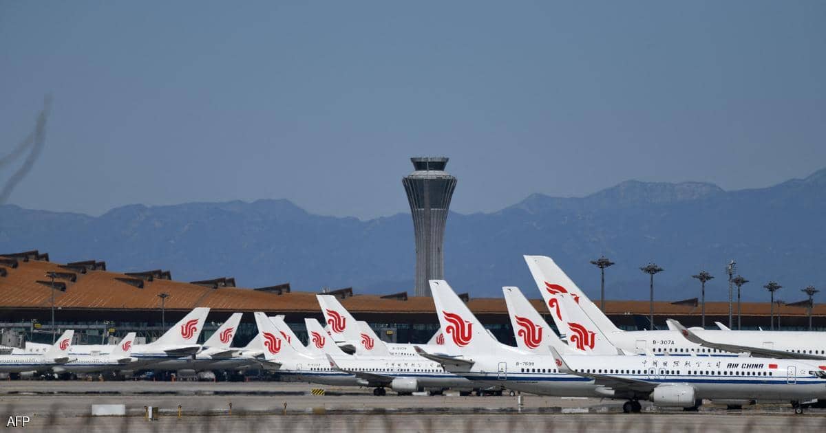 إصابات بكورونا تربك مئات الرحلات الجوية في الصين